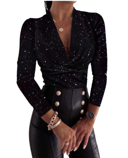 Blusa abotonada de lunares con volantes y manga larga